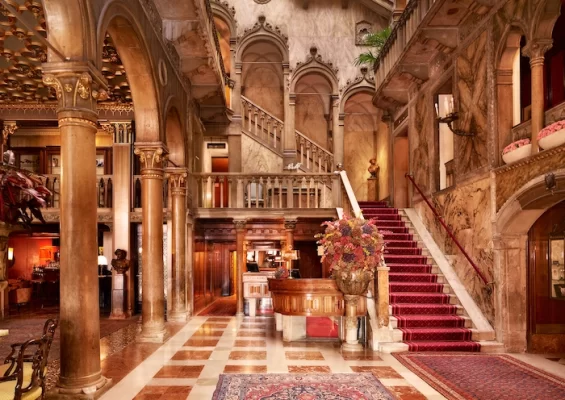palazzo dandolo hall hotel danieli matera apulia luxury tour grand lobby marble staircase historic hotel interior
