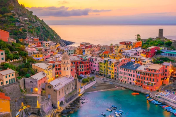 cinque terre vernazza luxury private boat tour colorful houses harbor sunset