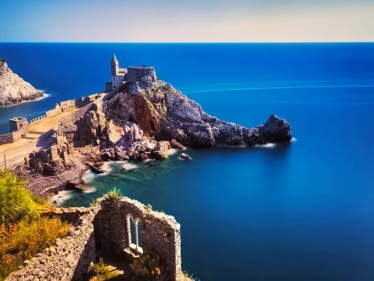 lerici gulf of poets liguria private boat tour portovenere san pietro church cliffside