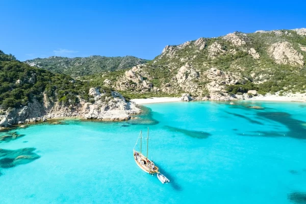 la maddalena archipelago sardinia luxury private boat tour sailboat turquoise water sandy beach