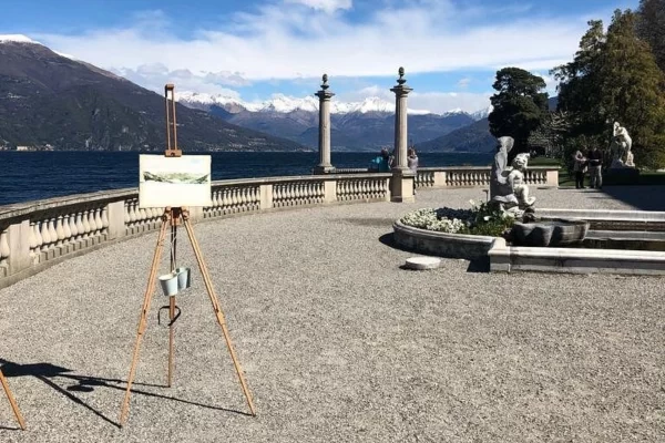 lake como easel painting mountains terrace