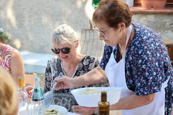 sardinia private tour cooking class serving pasta