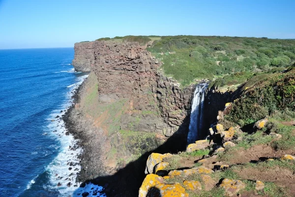 monte nieddu private tour waterfall cliffs sea